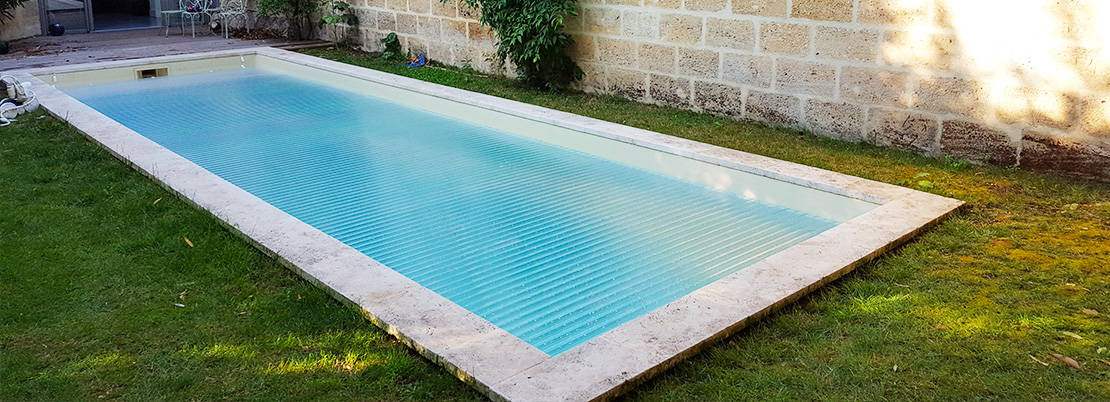 Volet piscine immergé avec caillebotis immergé et lames polycarbonate